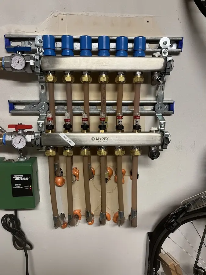 Plumber performing Water Heater Repair at a residential property in Berlin